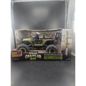 New Bright R/C Rock Crawler 4x4 Jeep Trailcat 2.4GHz USB Charge Full Function RC